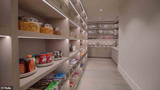 Snack pantry: Khloe shows him one of her favorite parts of the house, a massive pantry filled with snacks, which Scott says is, 'literally kids heaven'