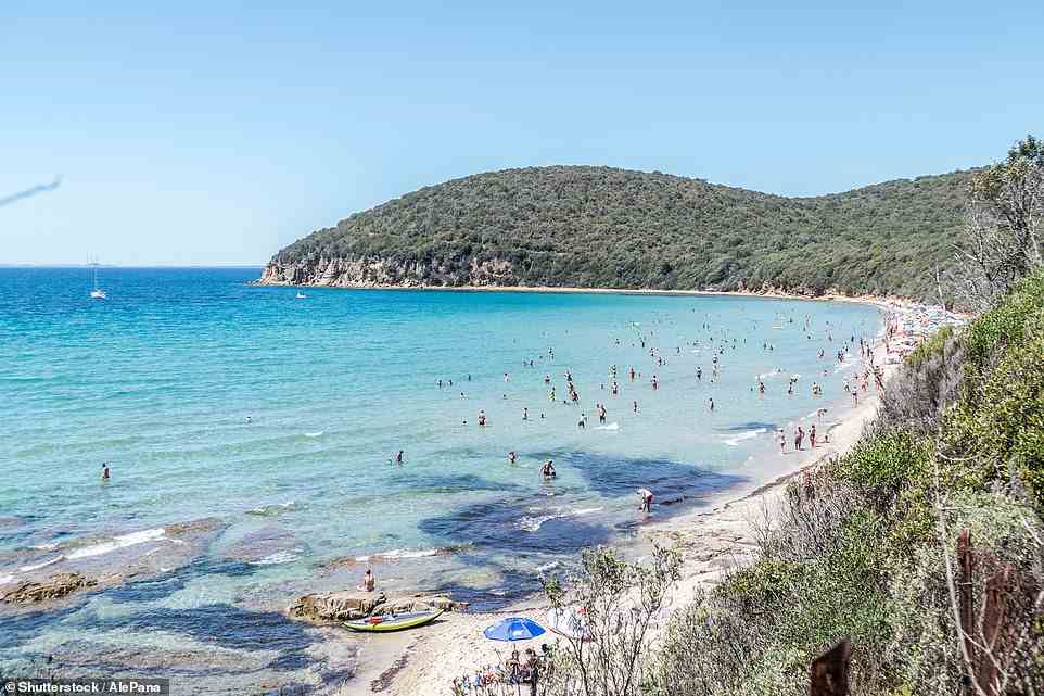 Above is picturesque Cala Violina, one of Italy’s most unspoilt beaches, which lies in the Maremma region