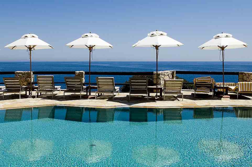 Glamour: Above is the clifftop pool at Hotel Il Pellicano in Porto Ercole, which is arguably the most glamorous hotel in Tuscany (if not Italy)