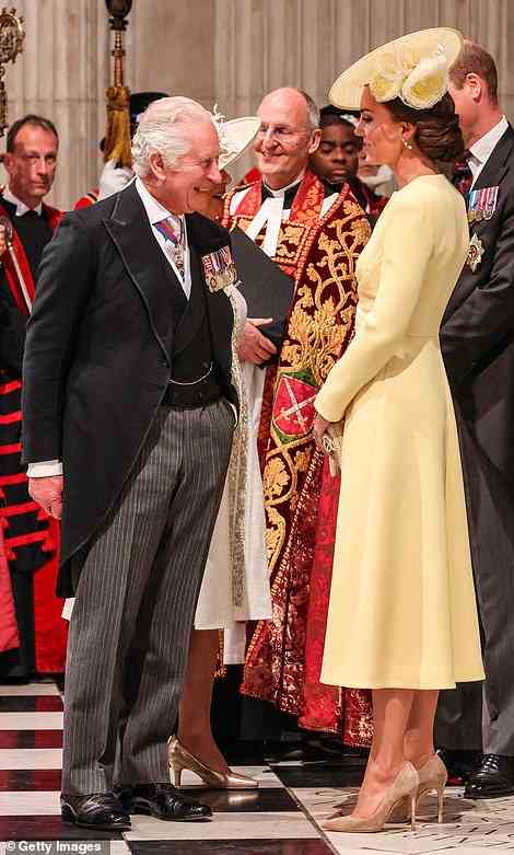 the Duchess apparently making the Prince of Wales chuckle during the event