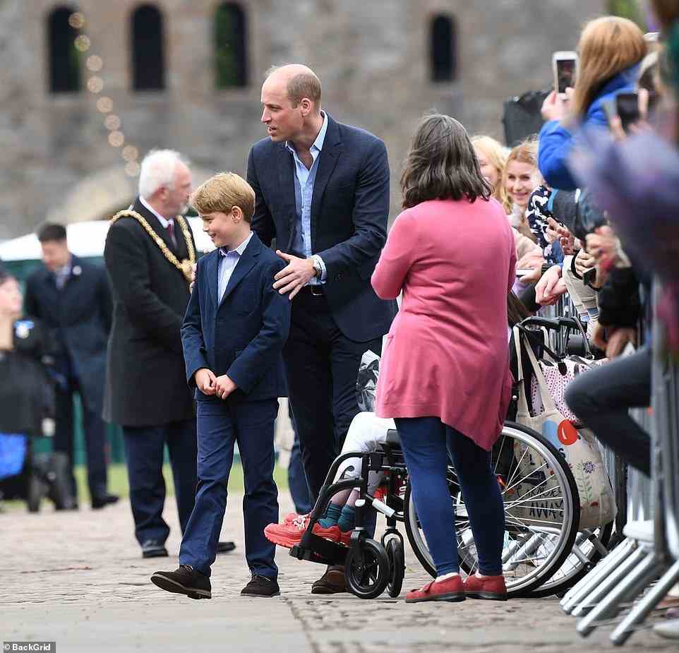 Prince George and his sister Princess Charlotte greeted members of the public on their first official royal visit to Wales