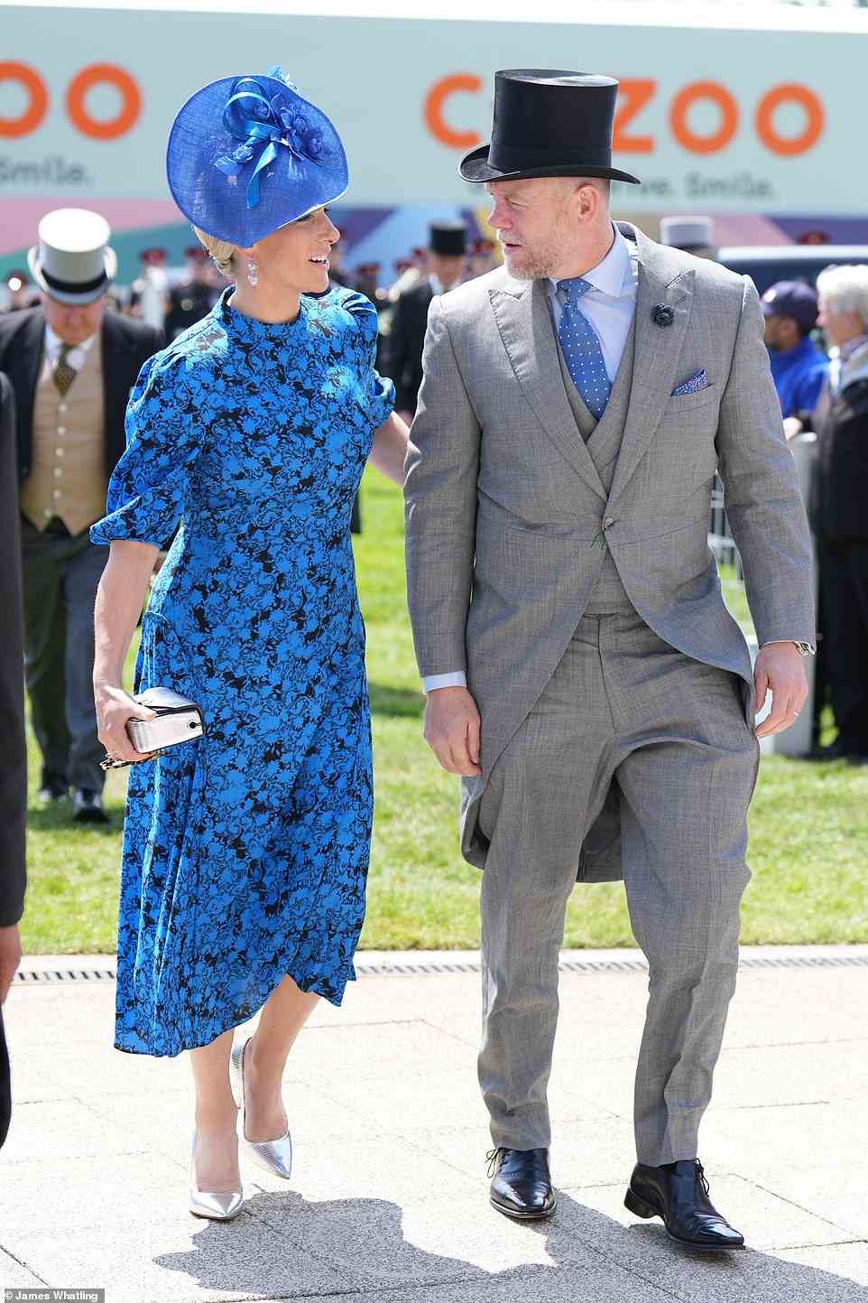 Zara put on a stunning display in a vibrant blue dress as she joined her husband at the Epsom Derby on Saturday afternoon