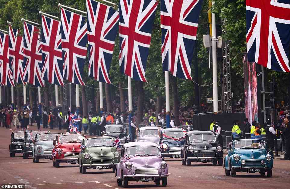 Morris Minor cars are seen during the Platinum Jubilee Pageant, June 5, 2022