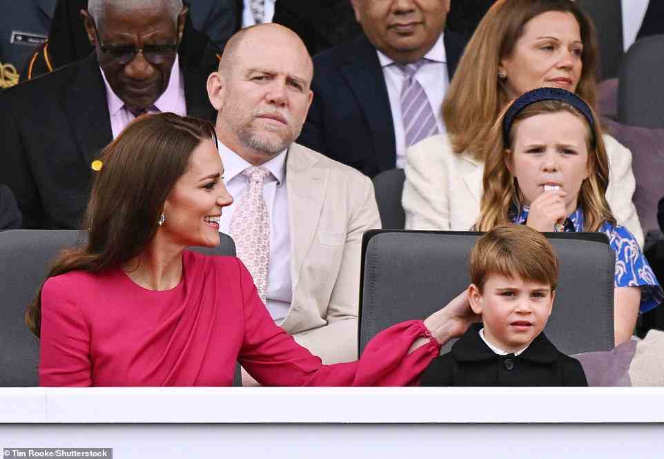 Kate Middleton appears to stroke the back of Prince Louis' head in the royal box, June 5, 2022