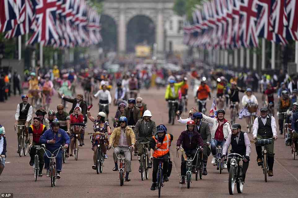 Riders with bicycles parade during the Platinum Jubilee Pageant outside Buckingham Palace in London, June 5, 2022