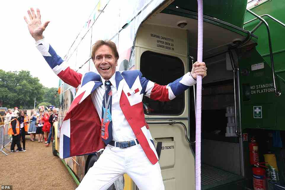Sir Cliff Richard climbs onboard the 1950s bus at Horse Guards Parade ahead of the Platinum Jubilee Pageant in London