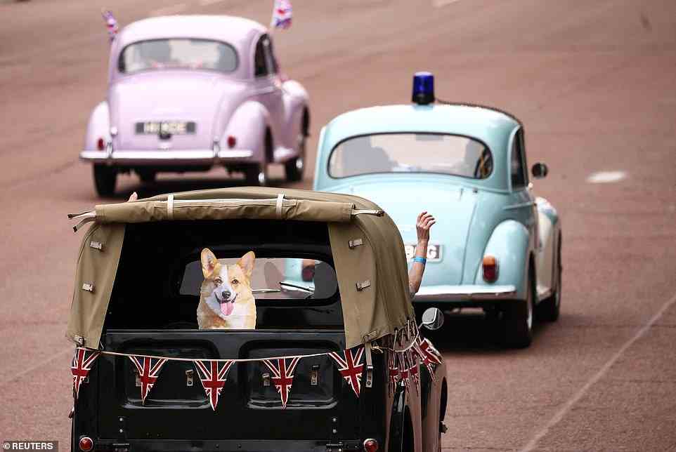 Morris Minor cars are seen during the Platinum Jubilee Pageant, June 5, 2022