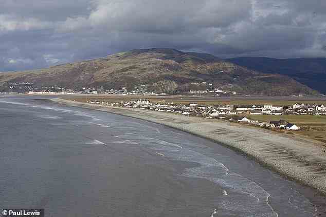 Fairbourne, in North Wales, is pictured. Fairbourne has around 410 homes, which will be defended until 2050, after which the council will start to 'decommission' the village