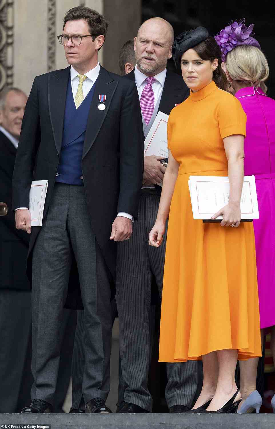 Images from Friday's thanksgiving service at St Paul's show Mike with Princess Eugenie (pictured, right, with her husband Jack Brooksbank, left). He later poked fun at her vibrant orange outfit
