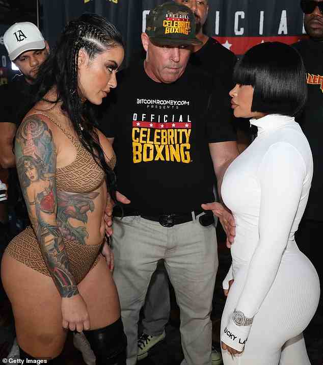Face to face: The news came with a snap of Chyna and Alysia staring each other down and being held apart by Celebrity Boxing CEO Damon Feldman