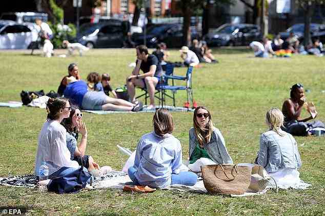 Sydneysiders will enjoy maximum temperatures of 20C on Thursday, with temperatures to reach 24C in Brisbane and 15C in Melbourne (pictured, Sydney residents in Double Bay)