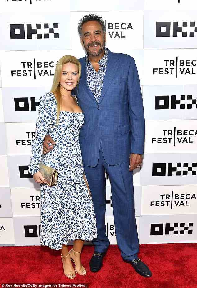 Newlyweds! Three-time Emmy winner Brad Garrett - who plays Andrew's stepfather Greg - brought along his second wife IsaBeall Quella whom he wed on November 11