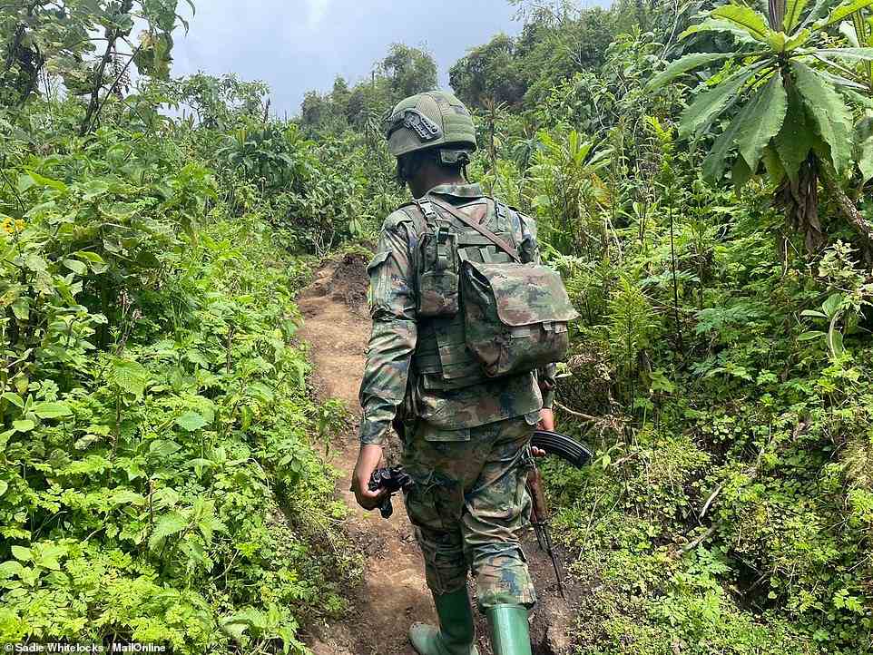 Soldiers were needed for Sadie's Mount Karisimbi trek because fighting has recently erupted in neighbouring Democratic Republic of the Congo