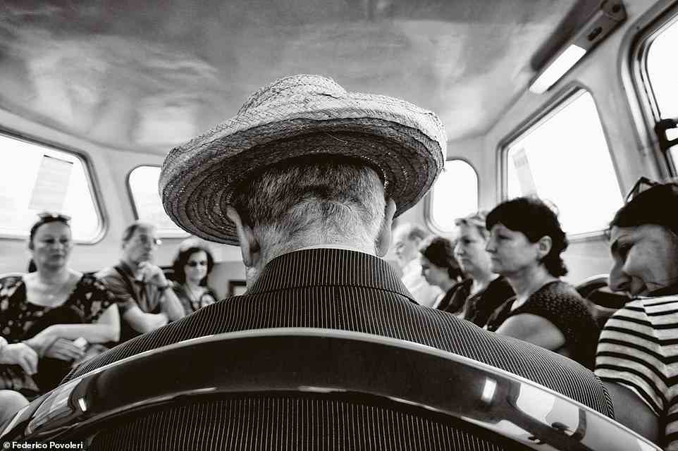 This candid shot was taken in a vaporetto, a public water bus with 19 routes that crisscross the lagoons of the city