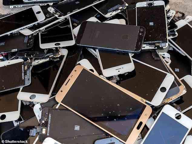 Smartphones, which tend to be replaced by an updated model after just a year, contribute to e-waste piles (file photo)
