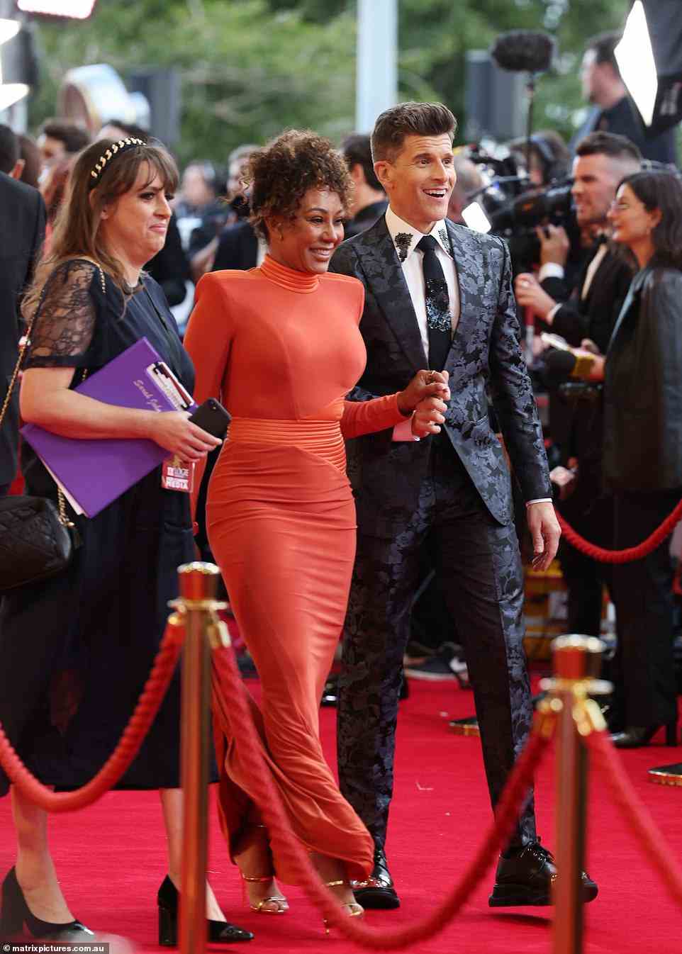 Mel B, 47, who was recently announced as a new panellist on The Masked Singer Australia arrived with the show's host Osher Gunsberg (both pictured)