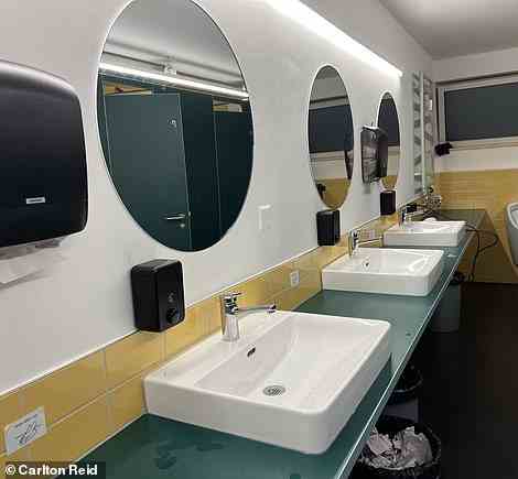 Toilets - such as the men-only one pictured - and showers are communal, Carlton reveals