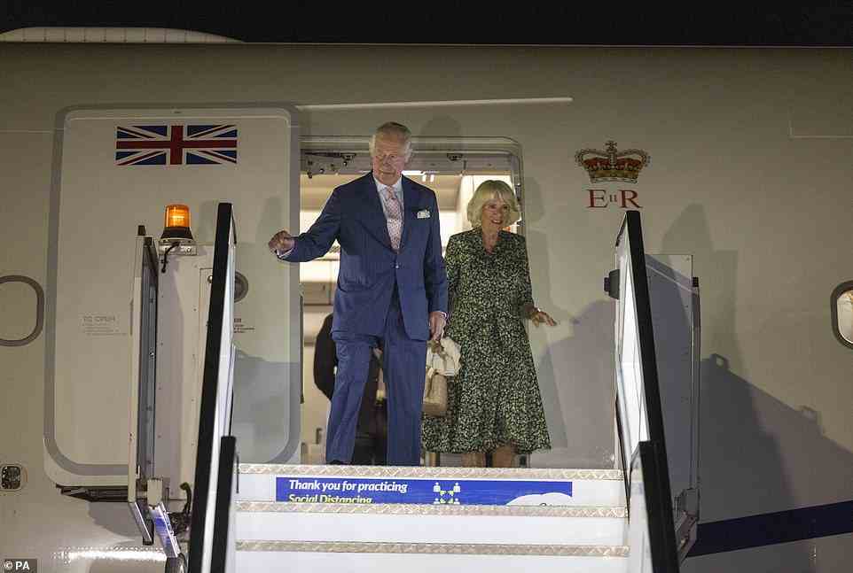 Charles and Camilla were pictured stepping off the ministerial jet RAF voyager as they touched down in Kigali, Rwanda, for their visit to the country and to attend the Commonwealth Heads of Government Meeting