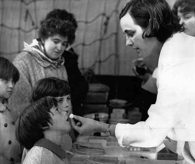 British children getting their oral vaccine for polio in 1965 — which used a live version of the virus — 12 years after the first vaccine was invented