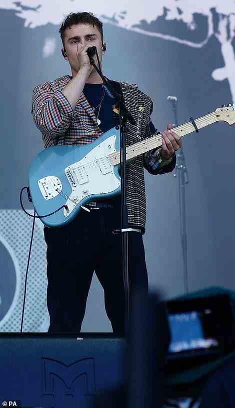 Performer: Elsewhere, Sam Fender, 28, kept things casual in a red-and-blue checked shirt, which he layered above a navy shirt and jeans during his gig on the Pyramid Stage