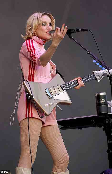 Unmissable: St Vincent flashed her toned pins in a pair of pink hot pants and a matching athletic zip-up top