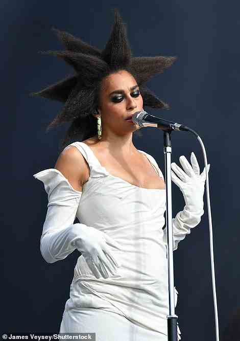 Born to perform: Also performing at the festival was fellow singer Celeste, 28, who wore a chic white dress with matching gloves