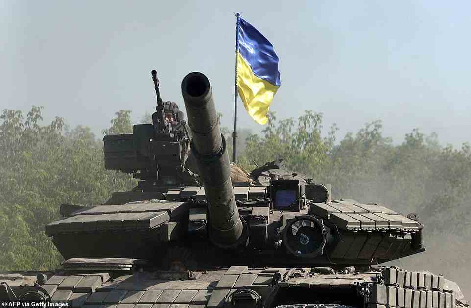 Ukrainian troop ride a tank on a road of the eastern Ukrainian region of Donbas last week, as Ukraine says Russian shelling has caused 'catastrophic destruction' in the eastern industrial city of Lysychansk, which lies just across a river from Severodonets
