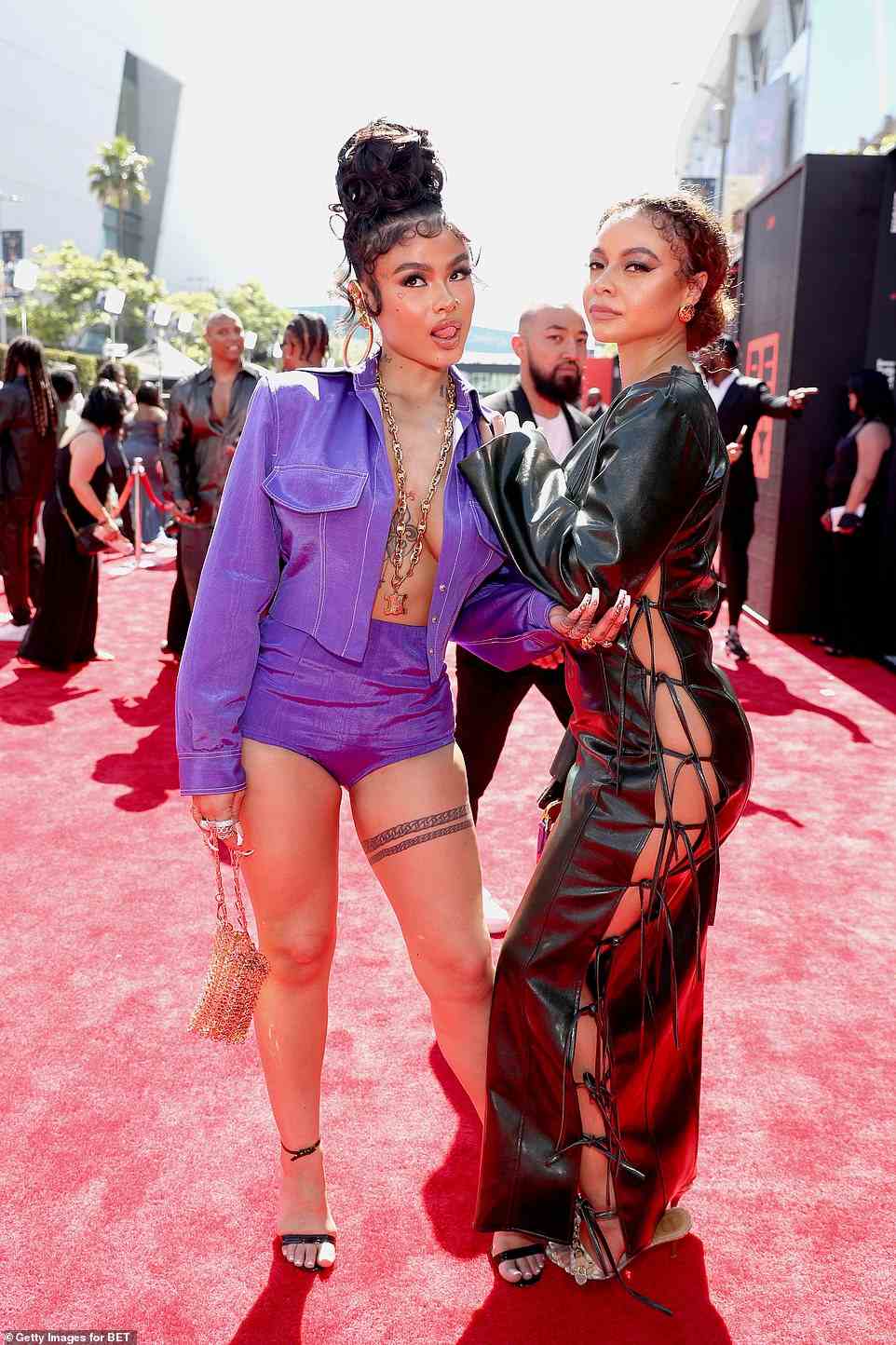 Vixens: She posed with Crystal Westbrooks, who sizzled in an alluring side-tie black leather dress