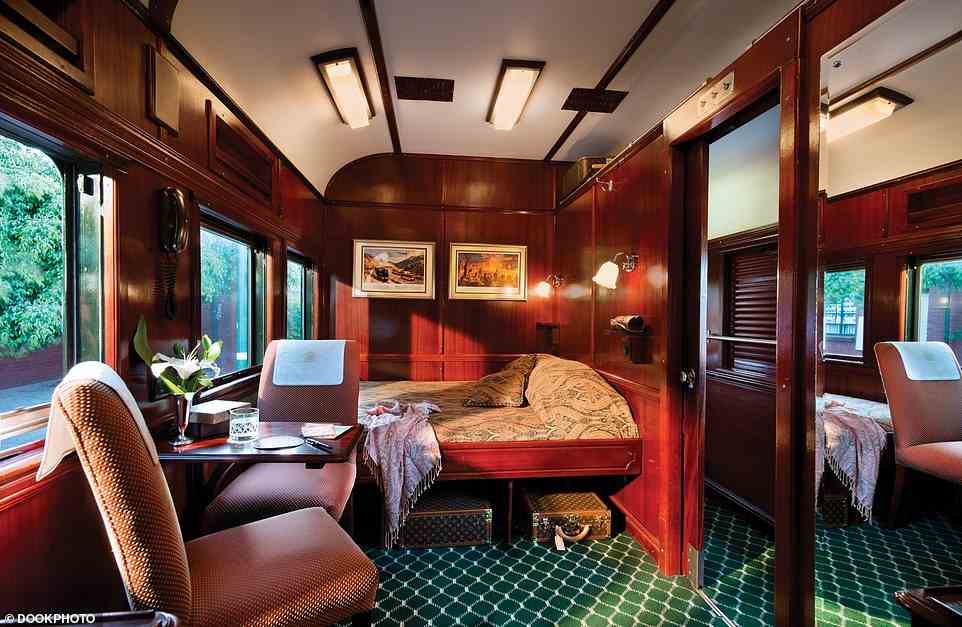 There are three classes of cabin on Rovos Rail's trains. Pullman Suites come with convertible sofa beds, Deluxe Suites (pictured) feature a twin or double bed and a lounge area. Royal Suites have king-size beds and a bathroom with a roll-top bath