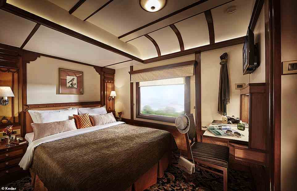 This image showcases a swanky Presidential Suite cabin on the Deccan Odyssey