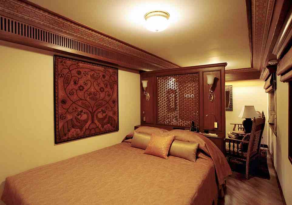 Pictured is one of the Suite bedrooms on the Maharajas' Express. With every step up through the cabin classes, you get more space, bigger windows, and the suites come with bathtubs instead of just a shower