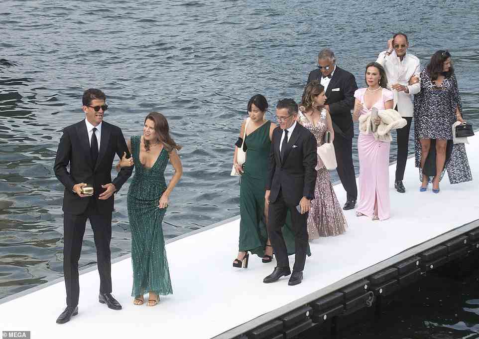 As well as closing the site for a month ahead of their big day on Saturday, the couple also installed a floating lakeside dock to welcome their 250 guests to the villa, meaning the surrounding parkland behind the villa was also closed