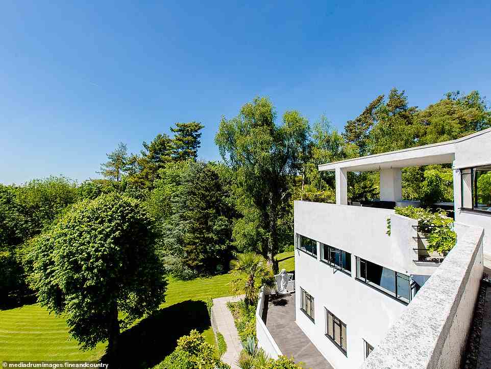 The roof top of the Modernist property will give the new owners a fantastic view of the home and its 1.7 acres of gardens and swimming pool