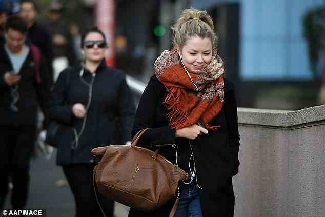 Pedestrians brave the cold in the central business district of Sydney, BOM predicts the mercury will rise on Thursday