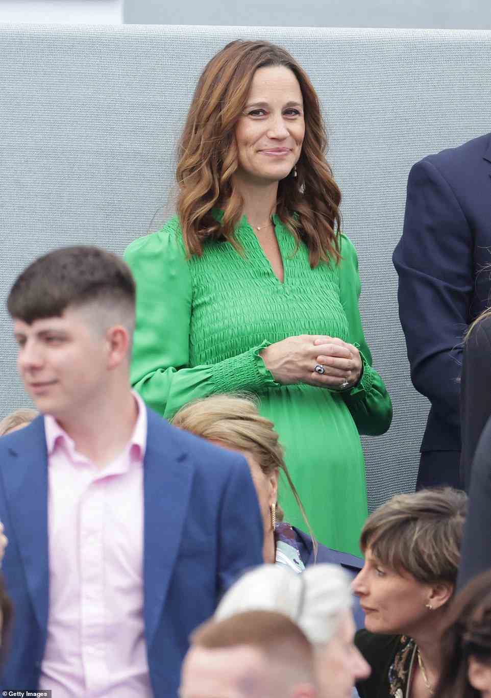 Pippa Middleton looked radiant in a green dress as she joined her parents Carole and Michael Middleton at the Platinum Party on Saturday night. The Duchess of Cambridge's sister stepped out in a lime green frock with ruched detailing across the chest for the star-studded night out at Buckingham Palace