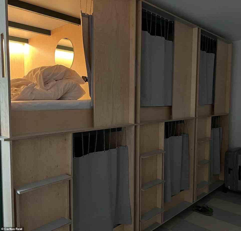 Carlton Reid checked into The Green Marmot capsule hotel in Zurich, with his room (above left) costing just £43.72 for the night