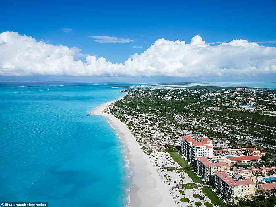 3. GRACE BAY, TURKS AND CAICOS: Big 7 Travel calls this 'the shining jewel of the Turks and Caicos Islands' and says: 'The entire beach is just over three kilometres (1.8 miles) long, with no pollution ¿ just pure, white sand and clean water.' Not only that, but a barrier reef protects Grace Bay from the ocean swells of the Atlantic, so you can swim with ease, the travel site reveals