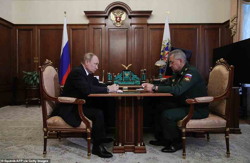 Vladimir Putin today ordered his defence minister Sergei Shoigu to press ahead with the offensive after seizing the entire Luhansk region with the capture of Lysychansk (pictured together today)