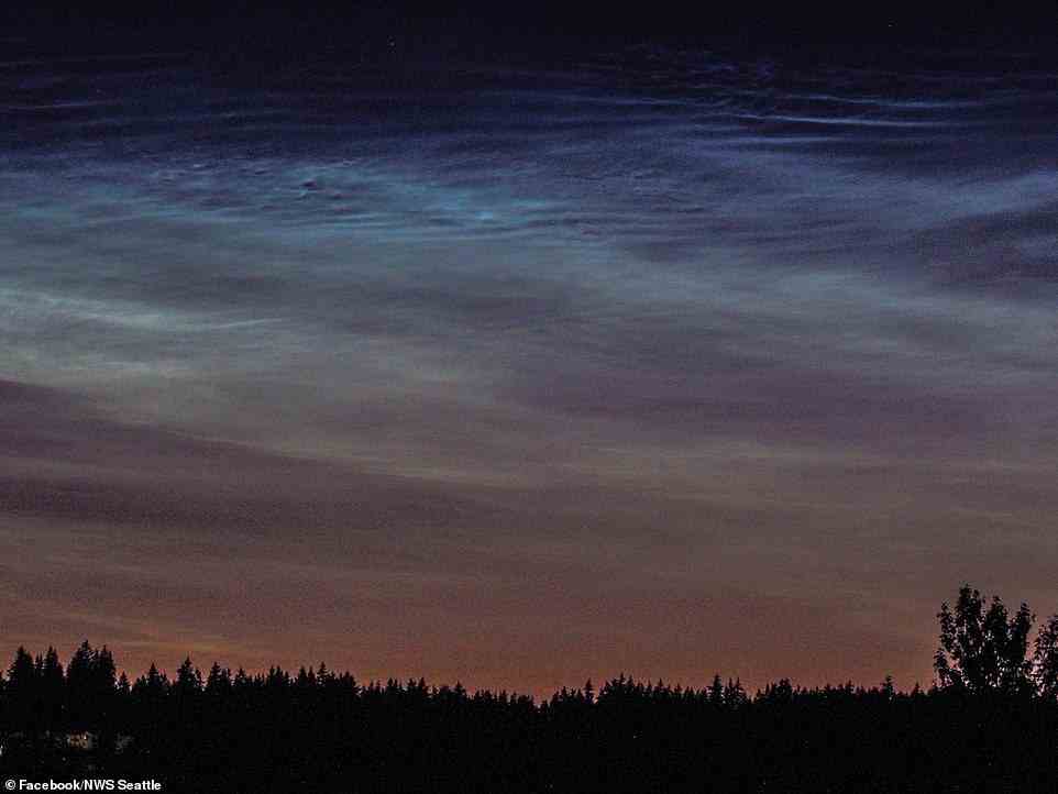 Leuchtende Nachtwolken (NLCs) bilden sich in der Mesosphäre, die sich in einer Höhe von etwa 50 Meilen befindet – und damit die höchsten in der Erdatmosphäre ist.  Bild zeigt Seattle, Washington