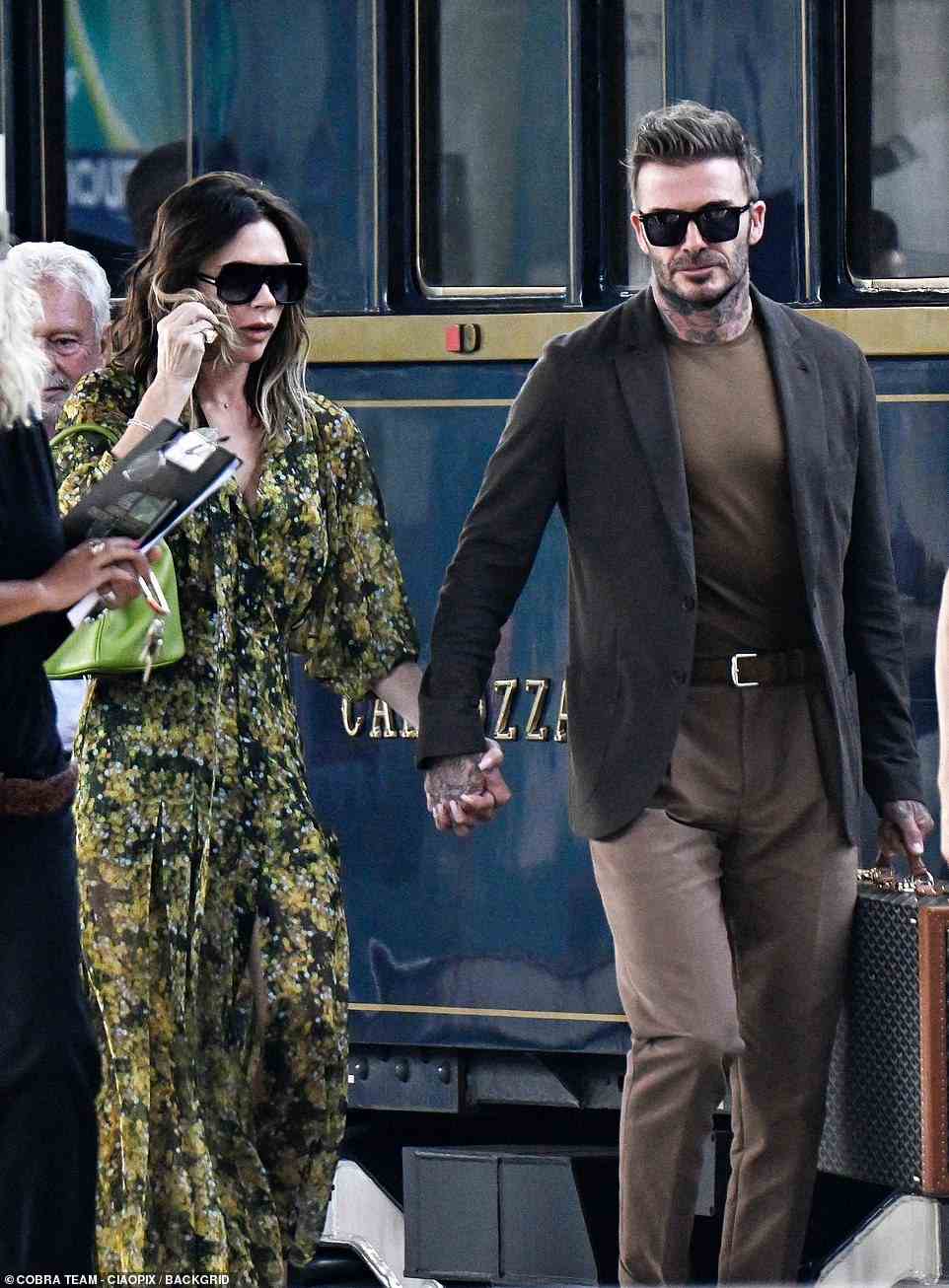 Sweet: Victoria and David were hand in hand as they arrived in Venice on the Orient Express