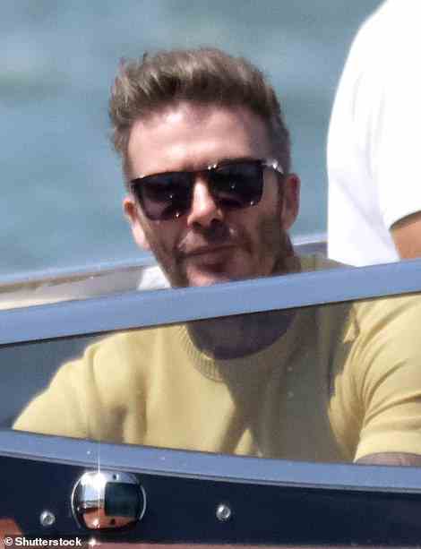 Chilled: David later wore a yellow T-shirt as he took in the views from the water taxi