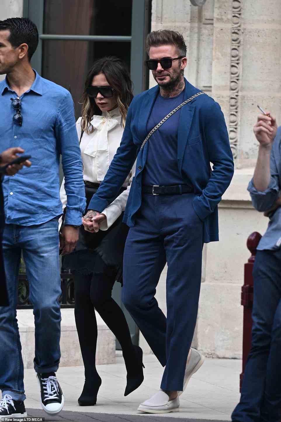 Anniversary outing! Ahead of David and Victoria sharing their gushing tributes, the couple were seen heading out for lunch at Le Bristol Hotel in Paris on Sunday