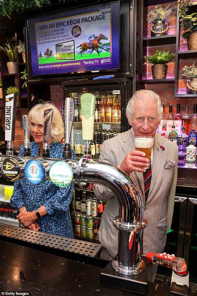 Charles also personally got behind the bar to pull a pint in The Lion pub, where he and his wife were greeted by a rousing Welsh choir