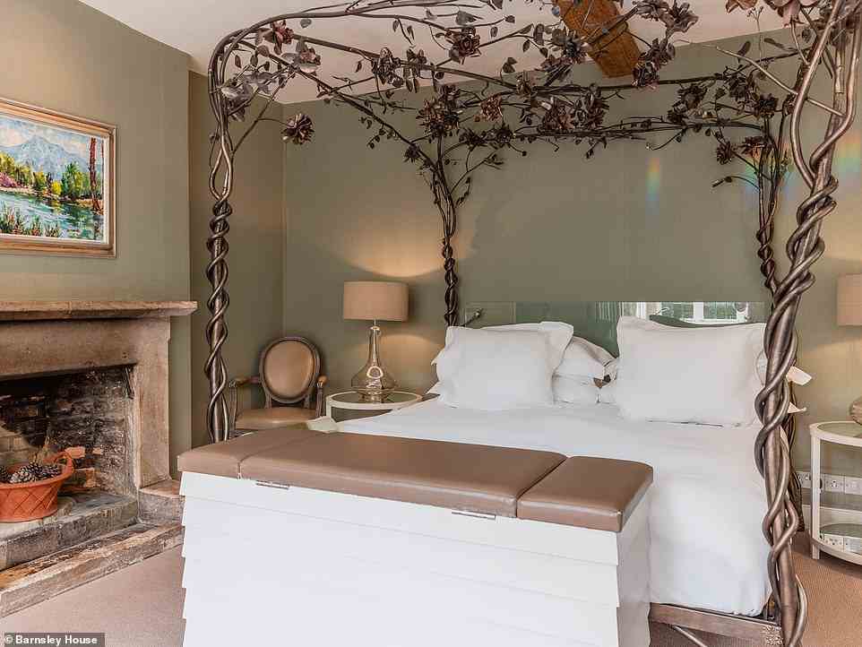 Rooms at Barnsley House are 'packed with guest extras and little luxuries, including plasma TVs in the bathrooms'