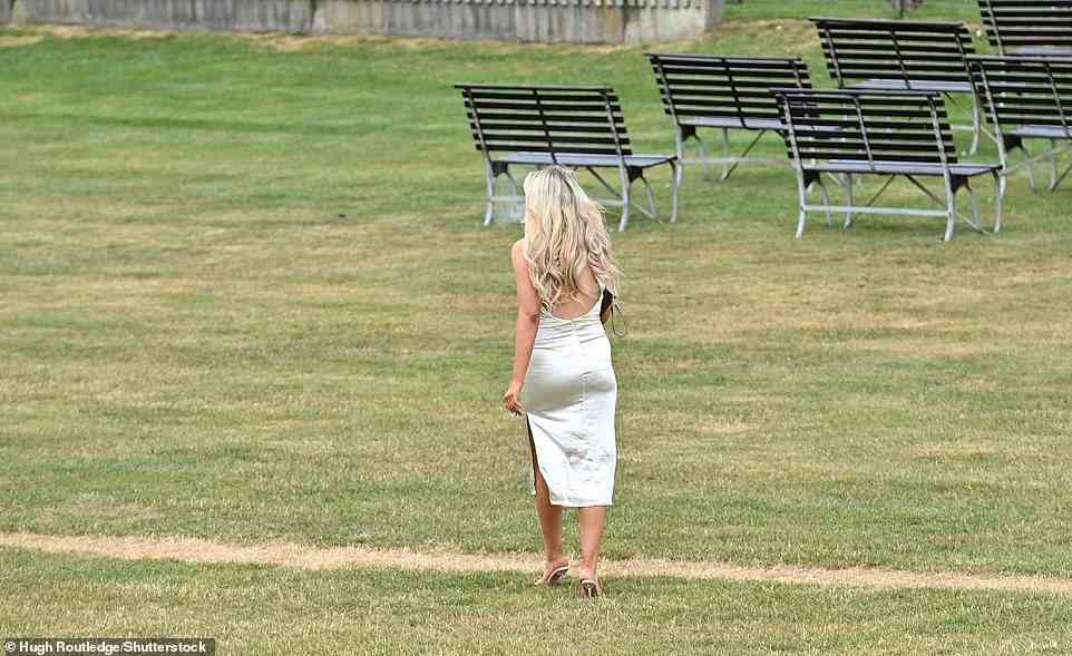 One lonely reveller was spotted roaming across the grass solo as she appeared to search for her friends at the racecourse in Suffolk