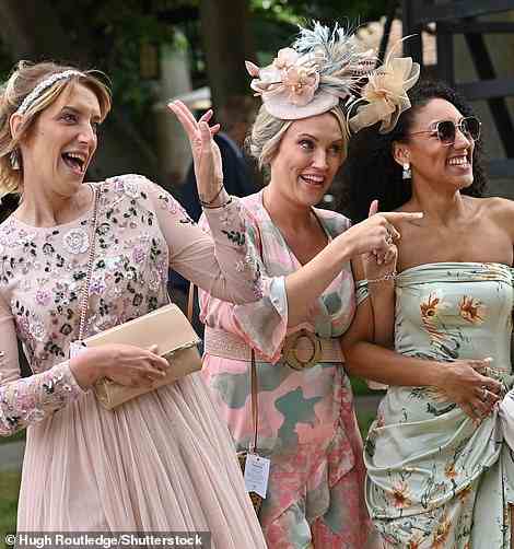 Getting into the swing of things! Revellers were delighted to be back at Ladies Day, sharing giggles and laughs with one another as they arrive