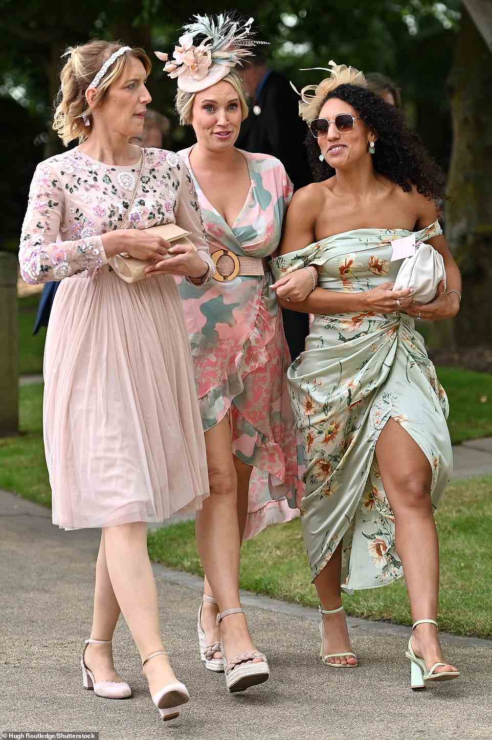 Walk this way! Many of the ladies attending the day opted to coordinate their outfits with friends, with one threesome wearing a selection of neutral and floral gowns for the outing