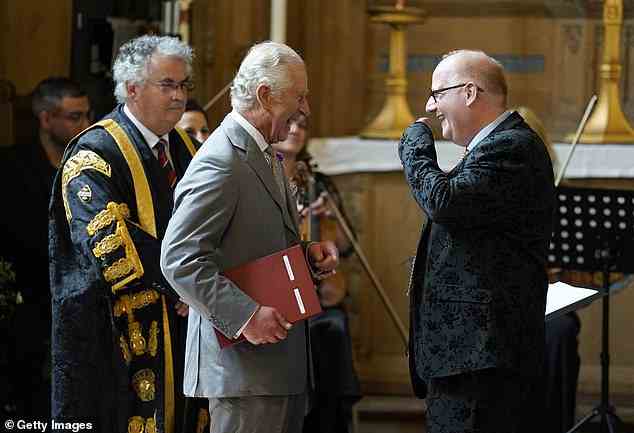 The Prince was all smiles after listening to a chort choral performanceat the ceremony at the university