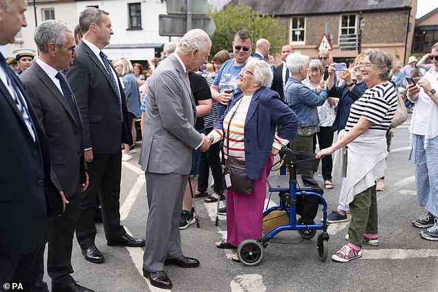 An elderly citizen welcomed the Prince of Wakes with a strong handshake during his visit to Narberth