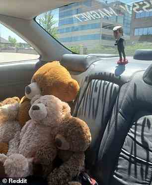 He had at least four teddy bears in the back seat and a Donald Trump bobblehead affixed to the rear dash
